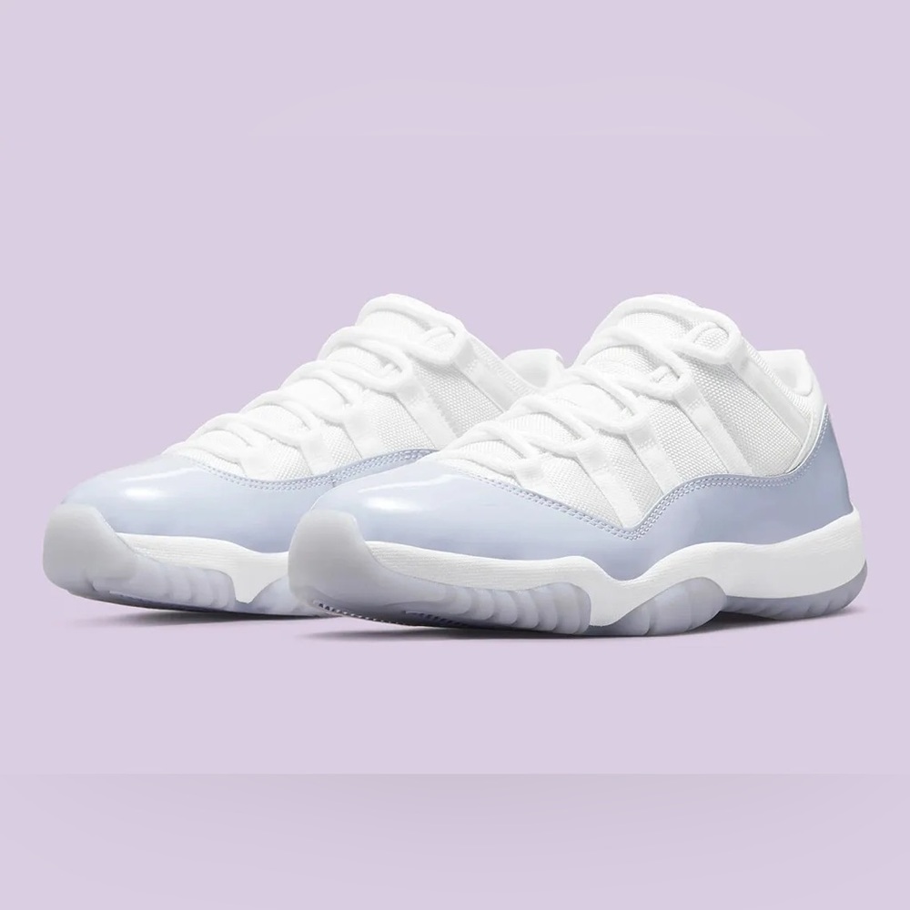 Woman’s Air Jordan 11 retro low in white/pure violet-white